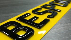 A yellow 4D gel number plate used for modern cars